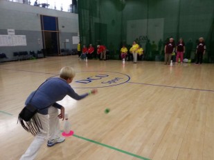 Lucy playing Skittles